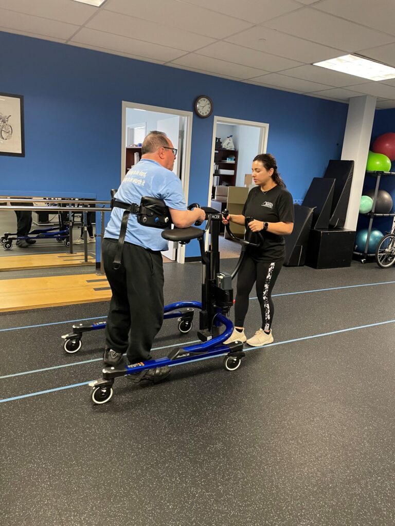 Push To Walk Trainer walking with Client