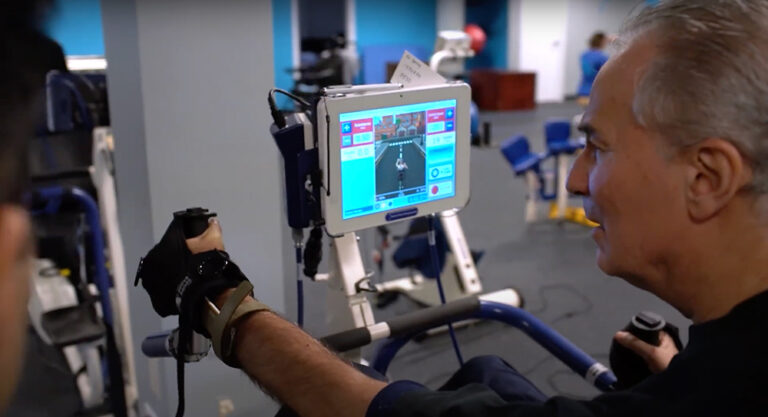 Push to Walk Patient on Hand Cycle with Screen